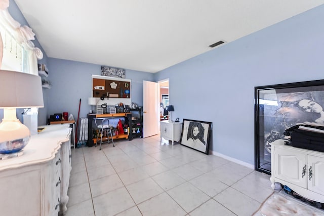 103 SW 18th St, Boynton Beach, FL 33426 - kitchen featuring light tile patterned floors and light countertops