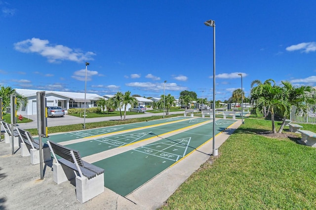 103 SW 18th St, Boynton Beach, FL 33426 - view of home's community with a yard and shuffleboard