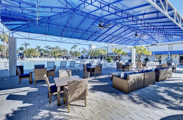 9620 Crescent View Dr N, Boynton Beach, FL 33437 - view of patio featuring outdoor dining space and a swimming pool