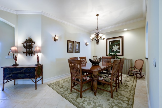 112 Palm Bay A Dr Unit A, Palm Beach Gardens, FL 33418 - dining area featuring crown molding, a chandelier, arched walkways, and baseboards