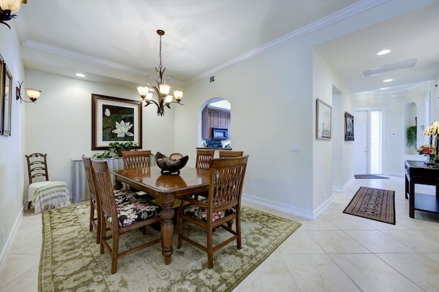 112 Palm Bay A Dr Unit A, Palm Beach Gardens, FL 33418 - dining area with arched walkways, a chandelier, crown molding, light tile patterned floors, and baseboards