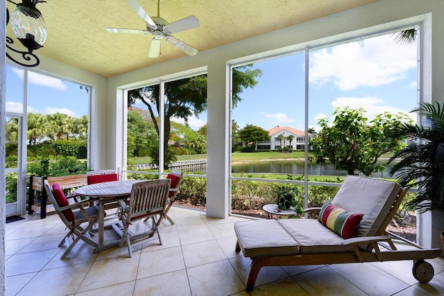 112 Palm Bay A Dr Unit A, Palm Beach Gardens, FL 33418 - sunroom / solarium with a water view, a textured ceiling, and tile patterned floors
