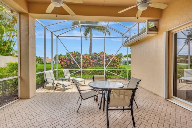 4498 Hazleton Ln, Lake Worth, FL 33449 - view of patio featuring ceiling fan and a lanai