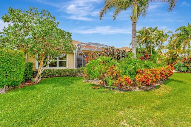 4498 Hazleton Ln, Lake Worth, FL 33449 - view of green lawn with glass enclosure
