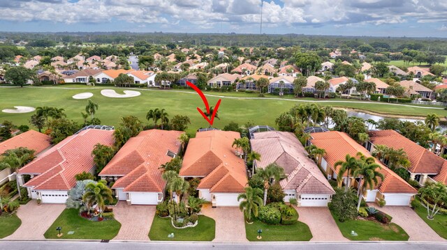 4498 Hazleton Ln, Lake Worth, FL 33449 - aerial view of residential area with a golf club and a nearby body of water