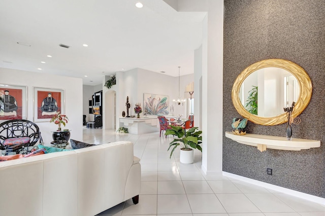 4498 Hazleton Ln, Lake Worth, FL 33449 - hall featuring a chandelier, baseboards, recessed lighting, and tile patterned floors