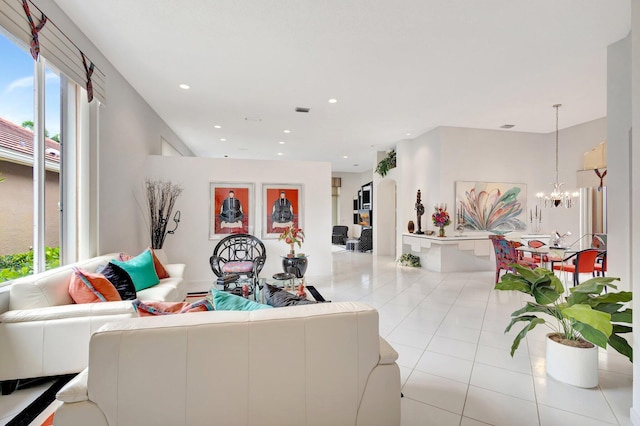 4498 Hazleton Ln, Lake Worth, FL 33449 - living area featuring light tile patterned floors, a chandelier, and recessed lighting