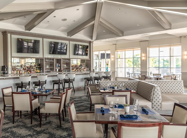 4498 Hazleton Ln, Lake Worth, FL 33449 - dining space featuring beam ceiling, coffered ceiling, and recessed lighting