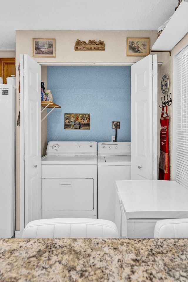 6738 Moonlit Dr, Delray Beach, FL 33446 - laundry room featuring washing machine and dryer