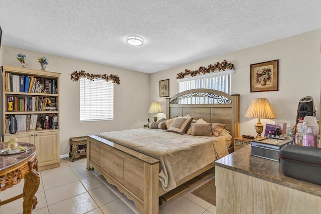 6738 Moonlit Dr, Delray Beach, FL 33446 - bedroom with multiple windows, light tile patterned flooring, and a textured ceiling