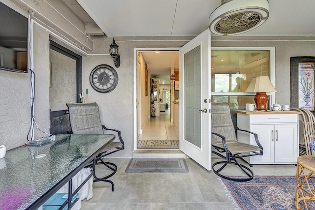 6738 Moonlit Dr, Delray Beach, FL 33446 - property entrance with stucco siding and french doors