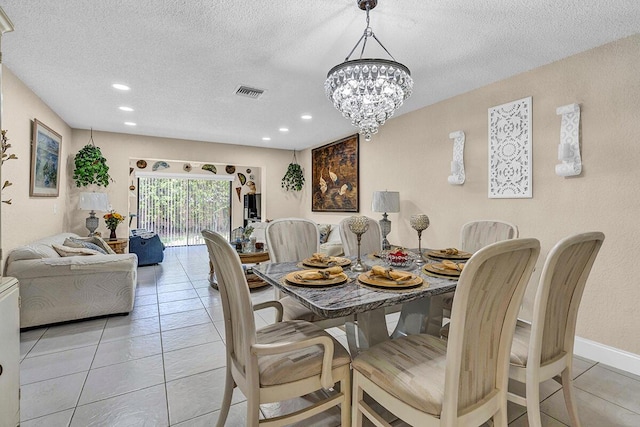 6738 Moonlit Dr, Delray Beach, FL 33446 - dining space featuring light tile patterned flooring, a textured ceiling, a chandelier, and recessed lighting