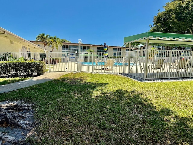 400 Village Green Cir W Unit 205, Palm Springs, FL 33461 - surrounding community featuring a swimming pool