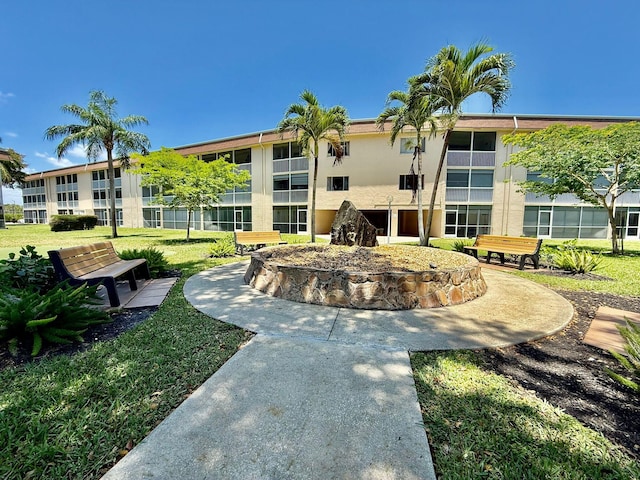 view of community with a yard
