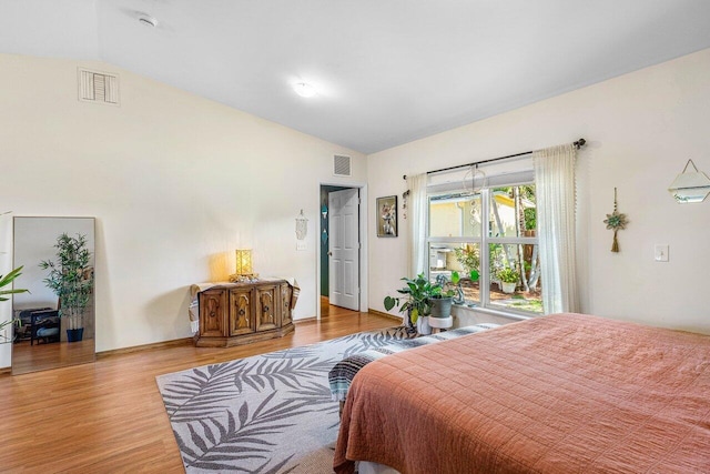 3064 Rostan Ln, Palm Springs, FL 33461 - bedroom featuring vaulted ceiling, wood finished floors, and baseboards