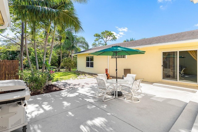 3064 Rostan Ln, Palm Springs, FL 33461 - view of patio / terrace with outdoor dining space