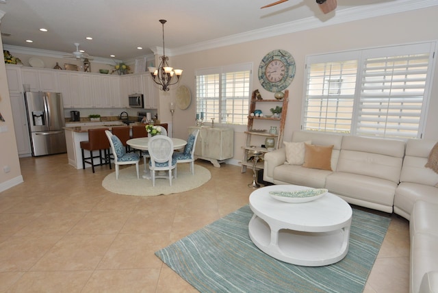 living area featuring a chandelier, crown molding, light tile patterned floors, recessed lighting, and baseboards