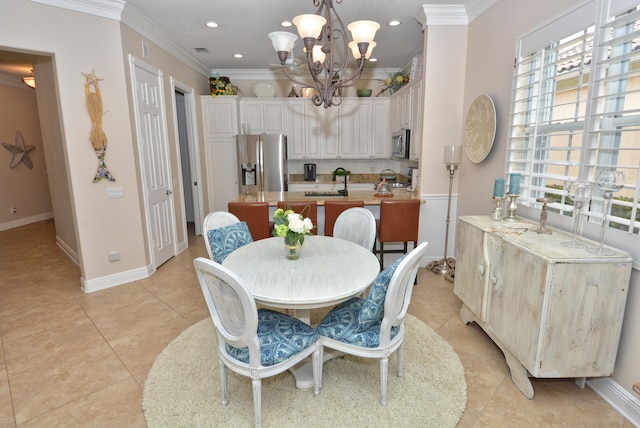 dining area with a chandelier, crown molding, light tile patterned floors, baseboards, and recessed lighting