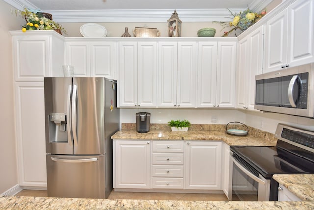 kitchen featuring stainless steel appliances, white cabinetry, crown molding, and light stone counters