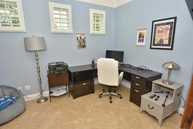home office featuring baseboards, ornamental molding, and light tile patterned floors