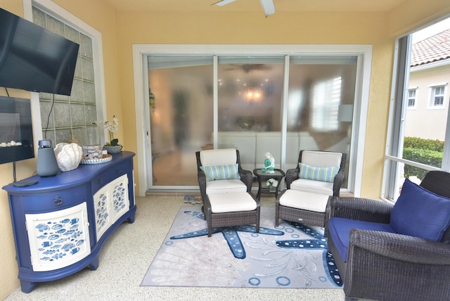 8699 SW Cruden Bay Ct, Stuart, FL 34997 - sunroom with ceiling fan and speckle patterned floor