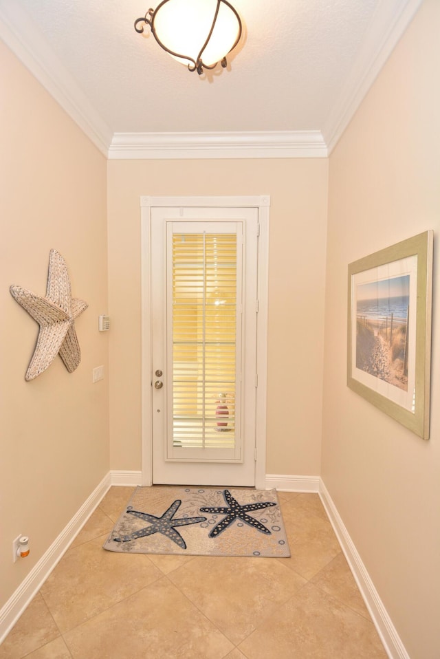 doorway featuring crown molding, light tile patterned floors, and baseboards