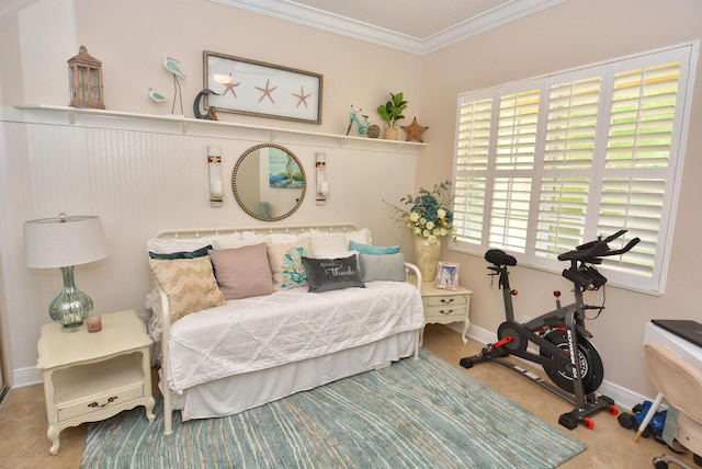 bedroom with ornamental molding, carpet, and baseboards