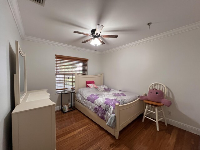 12147 Cuddington Ct, Wellington, FL 33414 - bedroom featuring dark wood-type flooring, ornamental molding, baseboards, and ceiling fan