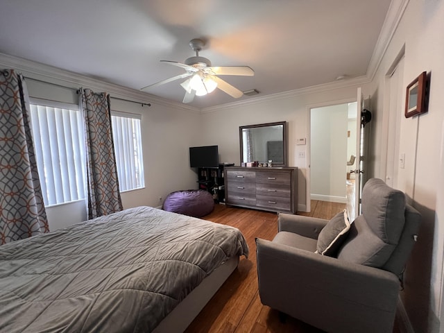 12147 Cuddington Ct, Wellington, FL 33414 - bedroom with dark wood-style floors, ornamental molding, a ceiling fan, and baseboards