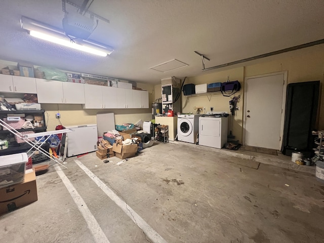 12147 Cuddington Ct, Wellington, FL 33414 - garage featuring washer and clothes dryer, refrigerator, and a garage door opener