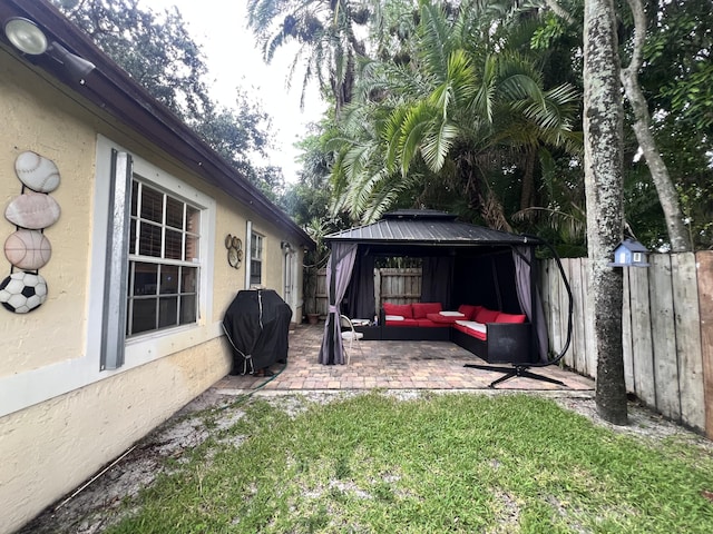 12147 Cuddington Ct, Wellington, FL 33414 - view of yard with an outdoor living space, a patio area, and a gazebo