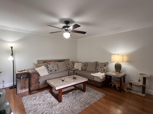 12147 Cuddington Ct, Wellington, FL 33414 - living room featuring crown molding, ceiling fan, wood finished floors, and baseboards