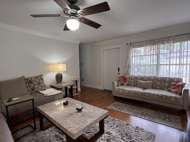 12147 Cuddington Ct, Wellington, FL 33414 - living area featuring healthy amount of natural light, wood finished floors, crown molding, a ceiling fan, and baseboards