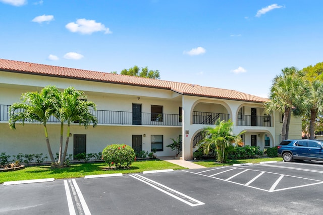 3 Via De Casas Sur Unit 204, Boynton Beach, FL 33426 - view of property with uncovered parking