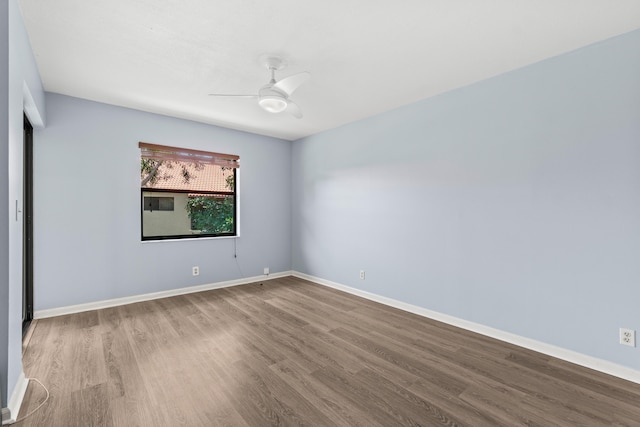 3 Via De Casas Sur Unit 204, Boynton Beach, FL 33426 - unfurnished room with wood finished floors, ceiling fan, and baseboards