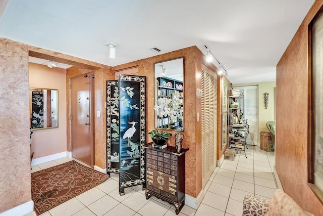 3701 S Flagler Dr Unit A101, West Palm Beach, FL 33405 - foyer with tile patterned floors and baseboards