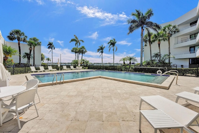 3701 S Flagler Dr Unit A101, West Palm Beach, FL 33405 - community pool with a patio area and fence