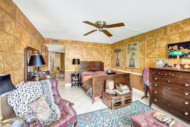 3701 S Flagler Dr Unit A101, West Palm Beach, FL 33405 - bedroom featuring light tile patterned floors, a ceiling fan, baseboards, and tile walls