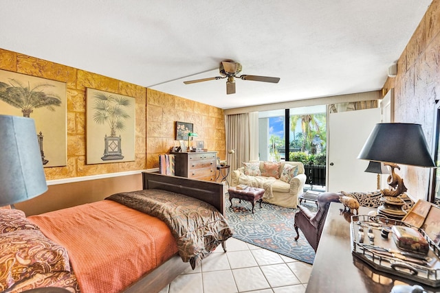 3701 S Flagler Dr Unit A101, West Palm Beach, FL 33405 - bedroom with access to exterior, light tile patterned floors, and ceiling fan