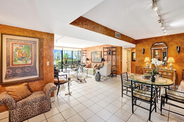 3701 S Flagler Dr Unit A101, West Palm Beach, FL 33405 - dining room featuring track lighting and light tile patterned floors