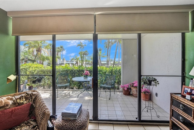 3701 S Flagler Dr Unit A101, West Palm Beach, FL 33405 - doorway to outside featuring light tile patterned floors