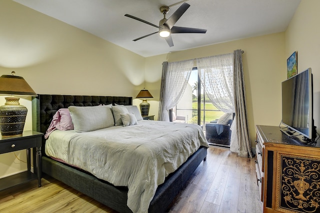 830 Greensward Ct Unit 107-H, Delray Beach, FL 33445 - bedroom with access to outside, wood-type flooring, and a ceiling fan