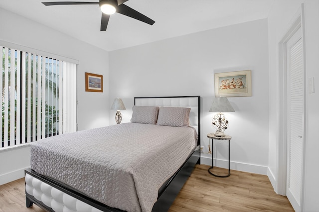 830 Greensward Ct Unit 107-H, Delray Beach, FL 33445 - bedroom featuring wood finished floors and ceiling fan