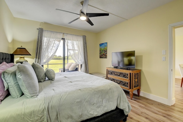 830 Greensward Ct Unit 107-H, Delray Beach, FL 33445 - bedroom with light wood-style flooring, baseboards, and ceiling fan