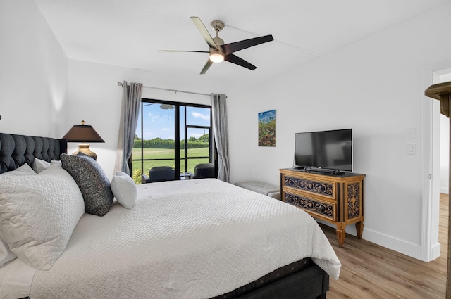 830 Greensward Ct Unit 107-H, Delray Beach, FL 33445 - bedroom with light wood-style floors, access to outside, and ceiling fan