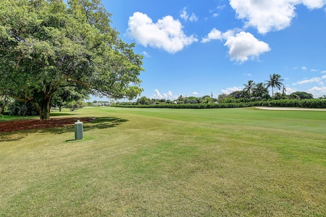 830 Greensward Ct Unit 107-H, Delray Beach, FL 33445 - view of property's community with view of golf course, a yard, and view of scattered trees