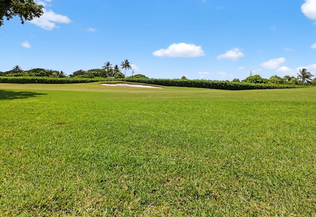 830 Greensward Ct Unit 107-H, Delray Beach, FL 33445 - surrounding community with view of golf course and a yard