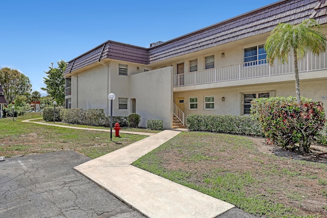 12003 Poinciana Blvd Unit 102, Royal Palm Beach, FL 33411 - view of building exterior