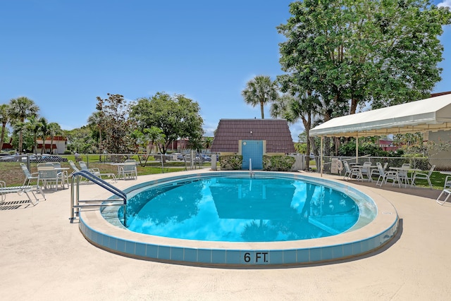 12003 Poinciana Blvd Unit 102, Royal Palm Beach, FL 33411 - community pool with a patio area