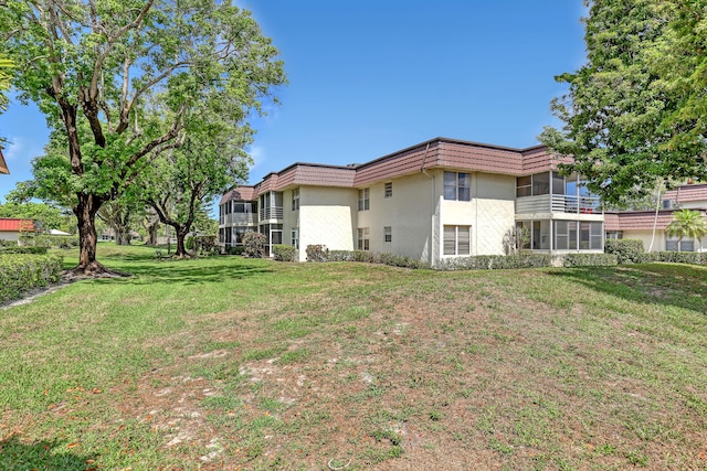 12003 Poinciana Blvd Unit 102, Royal Palm Beach, FL 33411 - view of green lawn